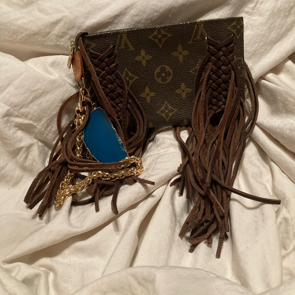 LV wristlet from vintage boho bags in California.